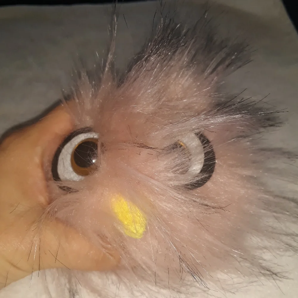 Pink fluffy bird keychain